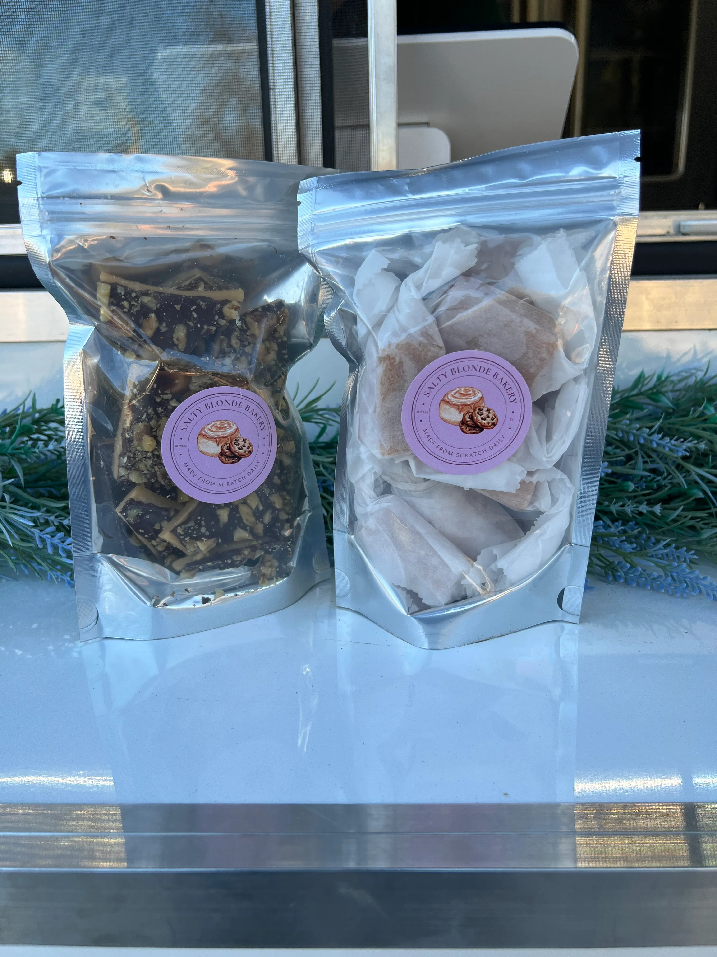 Individually packaged baked goods with lavender Salty Blonde labels.